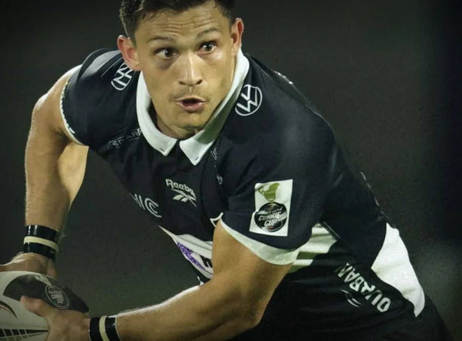 A Hollywoodbets Sharks XV player carries the ball into contact during a Carling Currie Cup match.